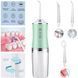 Іригатор для чищення зубів та порожнини рота Oral Irrigator з акумулятором та змінними насадками. QO-237 Колір: зелений