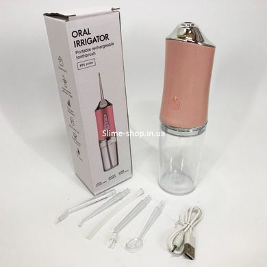 Іригатор для чищення зубів та порожнини рота Oral Irrigator з акумулятором та змінними насадками. BW-939 Колір: рожевий