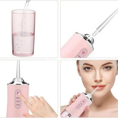 Іригатор для чищення зубів та порожнини рота Oral Irrigator з акумулятором та змінними насадками. BW-939 Колір: рожевий