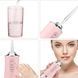 Іригатор для чищення зубів та порожнини рота Oral Irrigator з акумулятором та змінними насадками. BW-939 Колір: рожевий