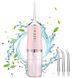 Іригатор для чищення зубів та порожнини рота Oral Irrigator з акумулятором та змінними насадками. BW-939 Колір: рожевий