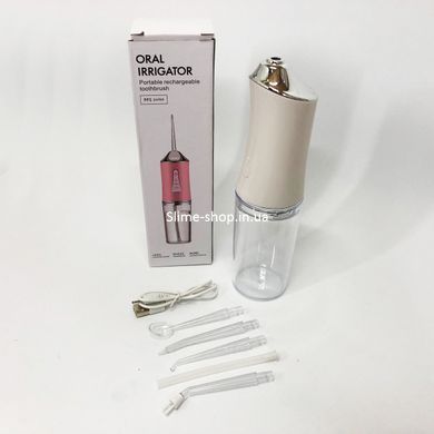 Іригатор для чищення зубів та порожнини рота Oral Irrigator з акумулятором та змінними насадками. UO-630 Колір: білий