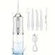 Іригатор для чищення зубів та порожнини рота Oral Irrigator з акумулятором та змінними насадками. UO-630 Колір: білий