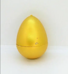Яйцо с динозавром Орбиз (из гидрогеля, растушка) золотого цвета 4,5x6 см (40402)