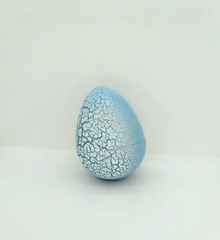 Яйцо с динозавром Орбиз (из гидрогеля, растушка) бело-голубое 4,5x6 см (40412)