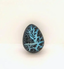 Яйцо с динозавром Орбиз (из гидрогеля, растушка) черно-голубое 4,5x6 см (40409)